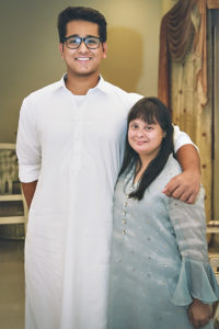 Faris Vohra (left) with his sister who has Down Syndrome.