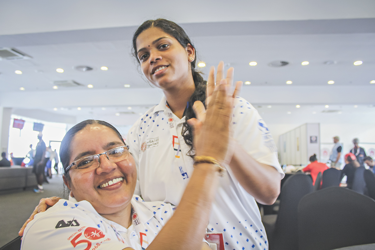 George Aplonia, a Special Olympics Asia Pacific athlete, with her Nailamma, a caretaker at the orphanage
