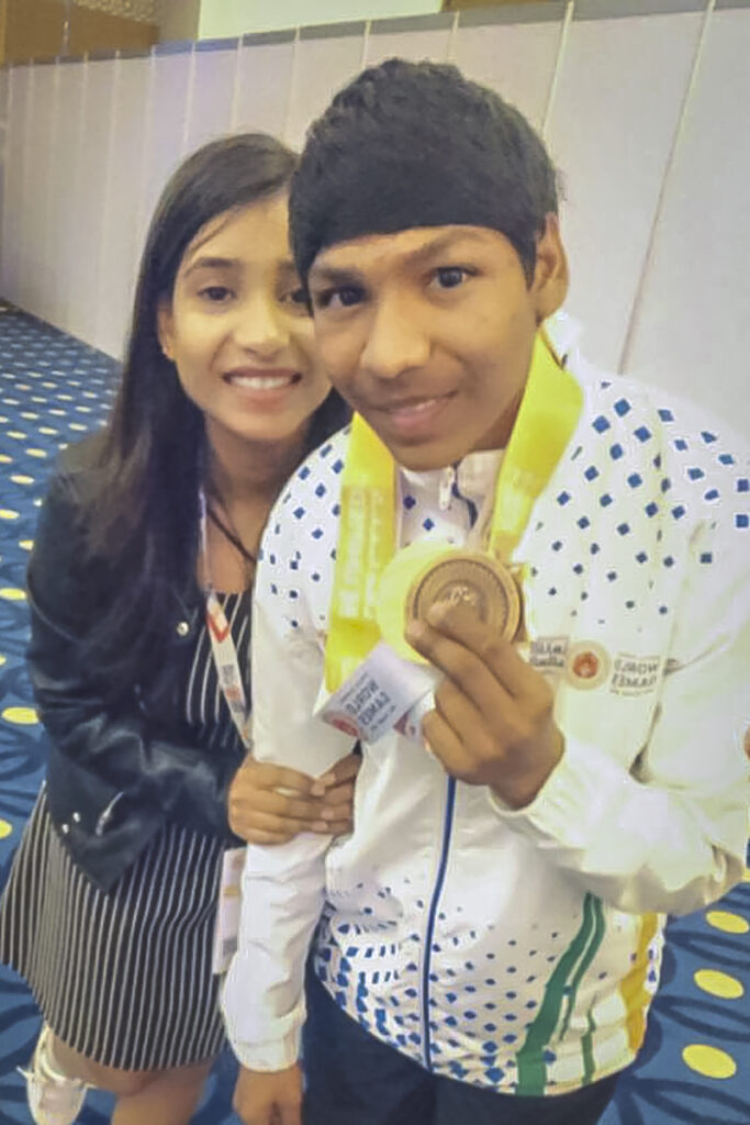 Shruti Jain celebrating the medal won by Rishab during Special Olympics World Games in Dubai